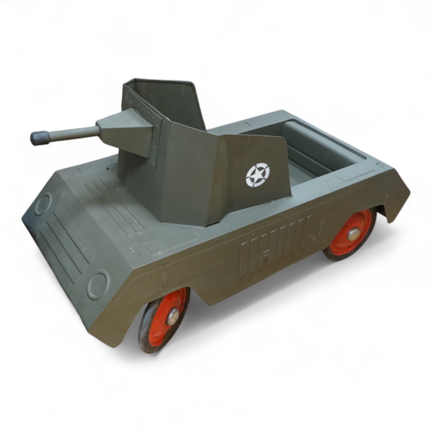 A 1950s Tri-ang pedal car in the form of a US Army tank, repainted in khaki green, 88cm long, 40.5cm wide, 50cm high. Condition - good, in restored and repainted condition.